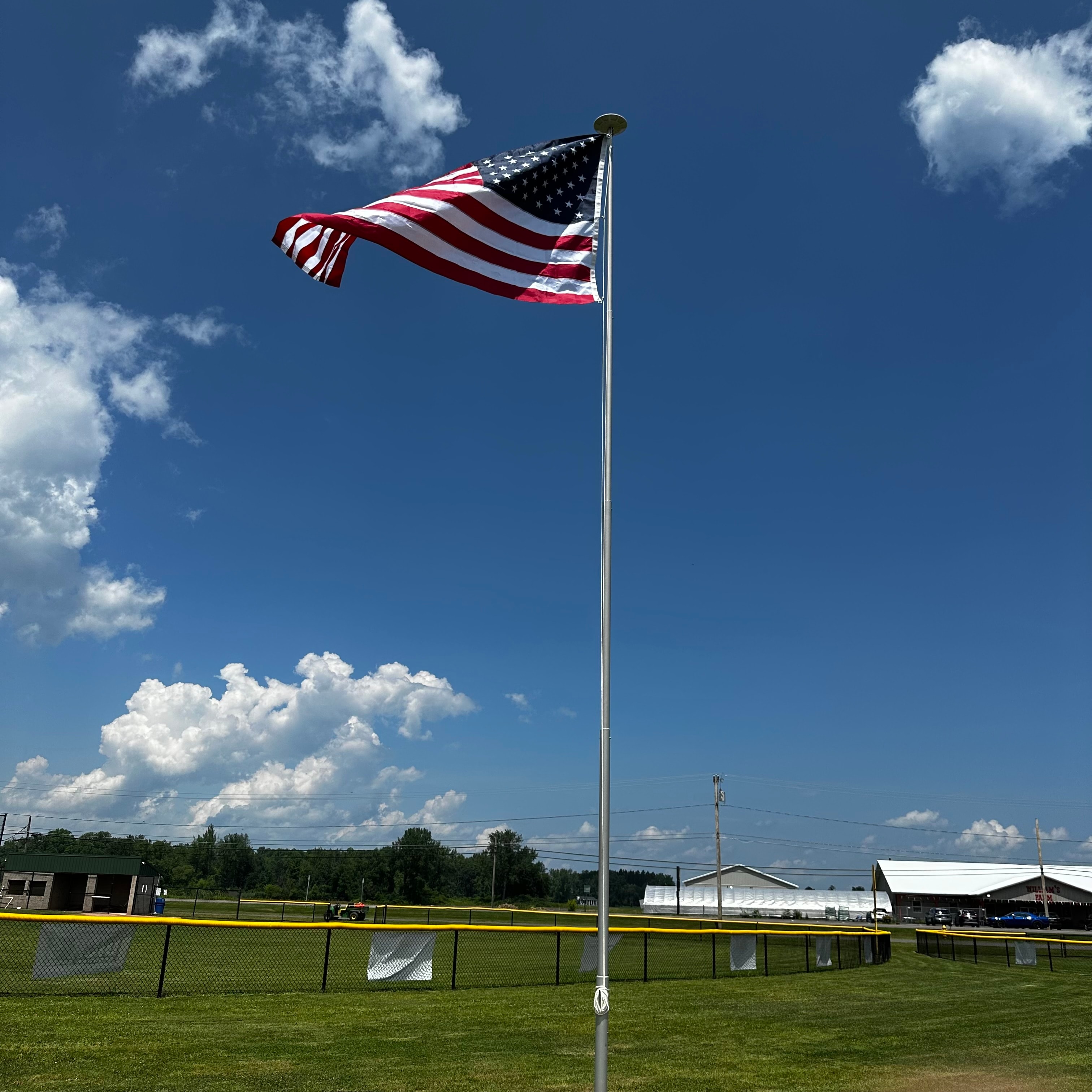American flag flying on the new flagpole at Central Park in Cicero